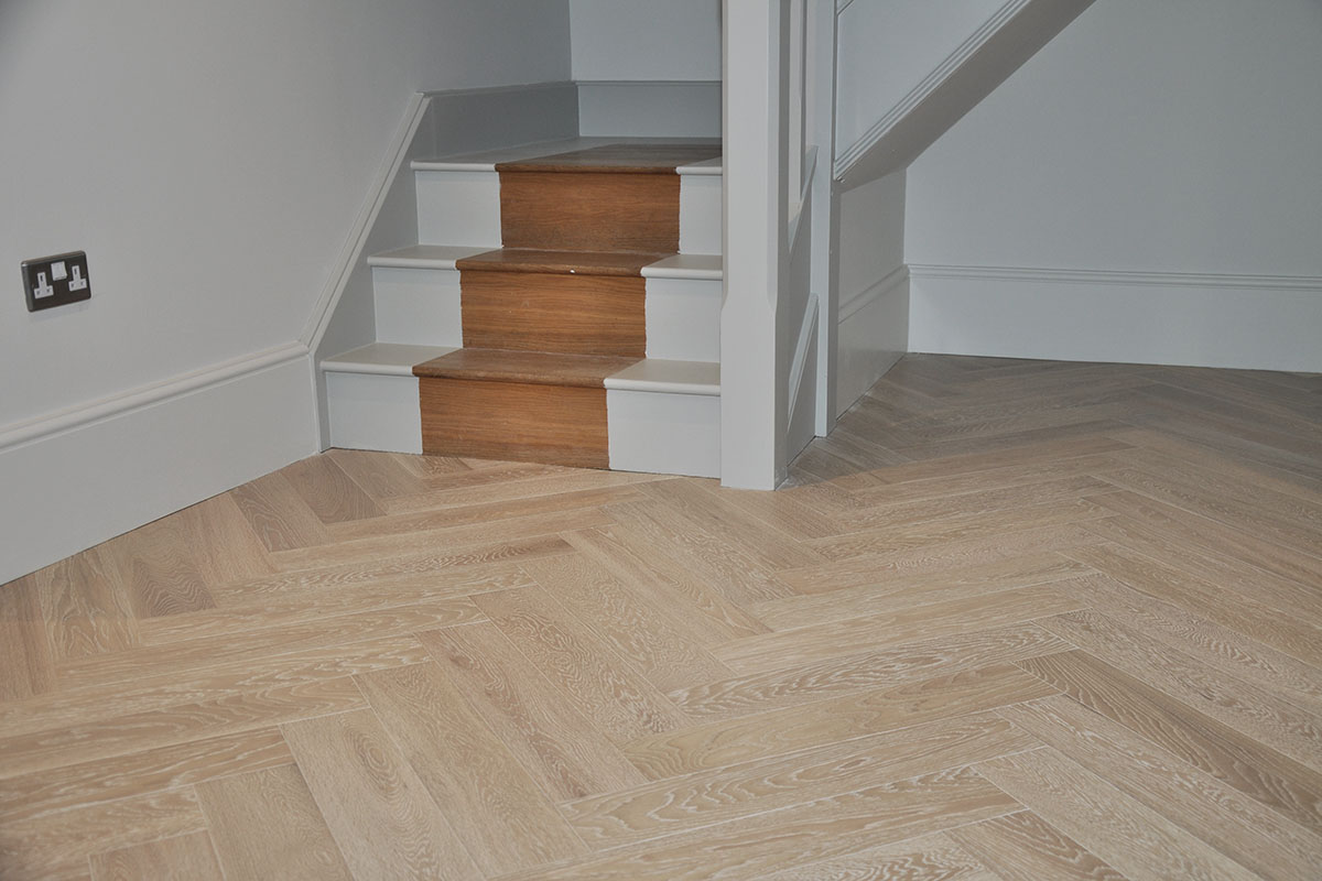 Herringbone Extra White Washed pre-finished Herringbone Parquet